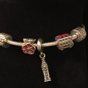 Pandora bracelet with 3 charms: big bend & bus